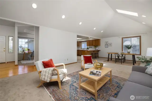 Main living area with entry at left. Kitchen is off of the dining area.