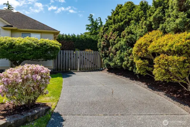 2nd driveway for RV/boat parking access.