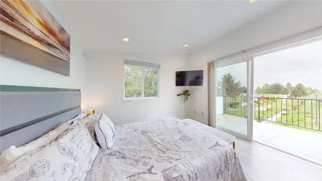 Gorgeous loft with tranquil view and access to a large deck. Unit 2 - 890 Magellan Ave NE, Ocean Shores, WA 98569