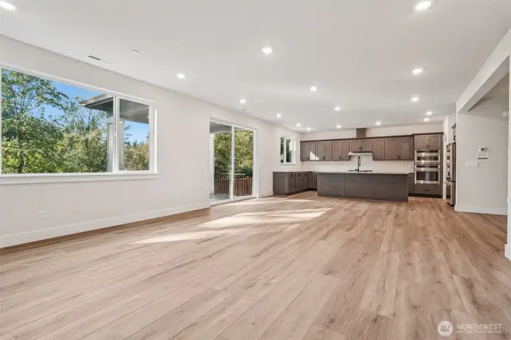 Pic is of similar home, layout and materials of surfaces may vary. Cabinets to be white in actual home.