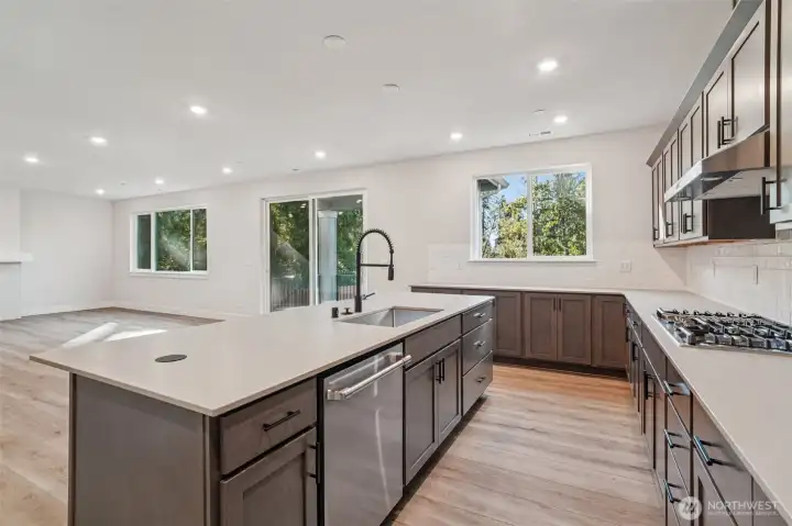 Pic is of similar home, layout and materials of surfaces may vary. Cabinets to be white in actual home.