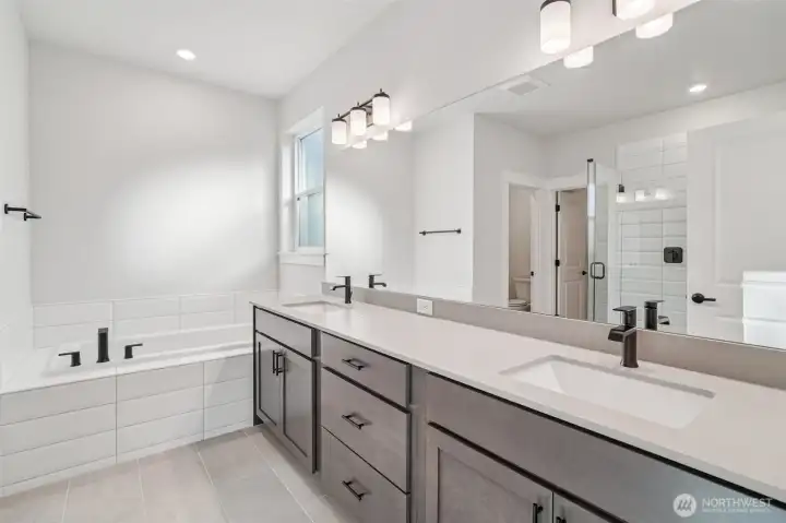 Pic is of similar home, layout and materials of surfaces may vary. Cabinets to be white in actual home.