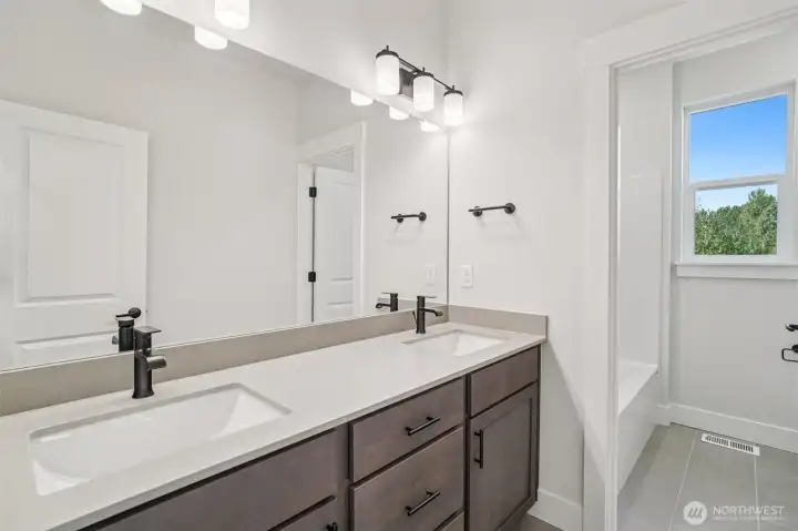Pic is of similar home, layout and materials of surfaces may vary. Cabinets to be white in actual home.