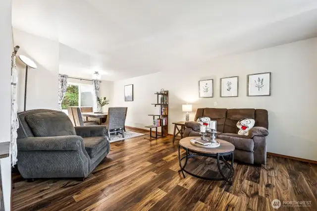 To your right at entry you will find a large living room and formal dining.