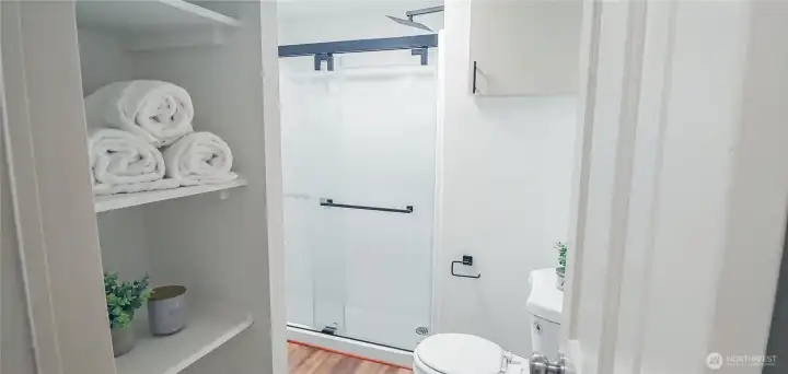 Homes bath features all new finishes including a walk-in shower