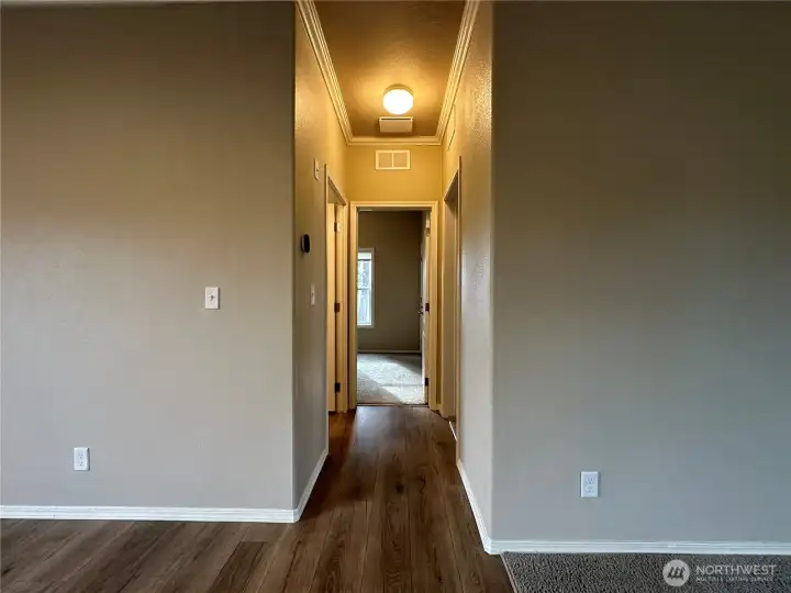 Hallway to bathroom and bedrooms