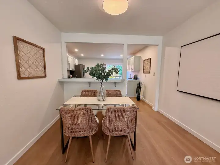 A dining area between the living room and kitchen.