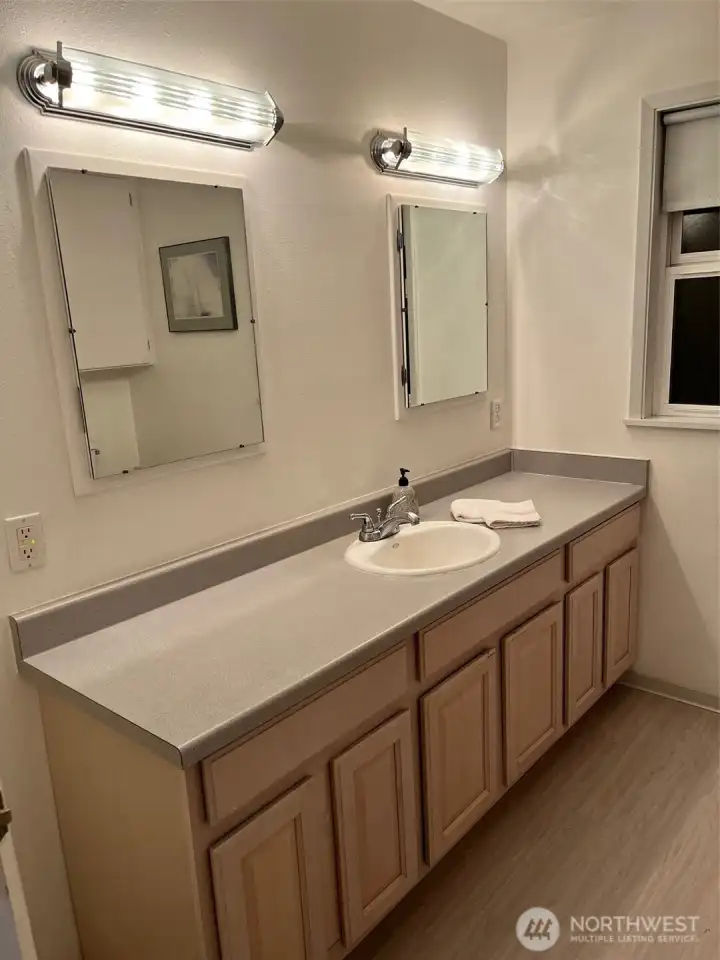 Dual-mirror bathroom vanity.