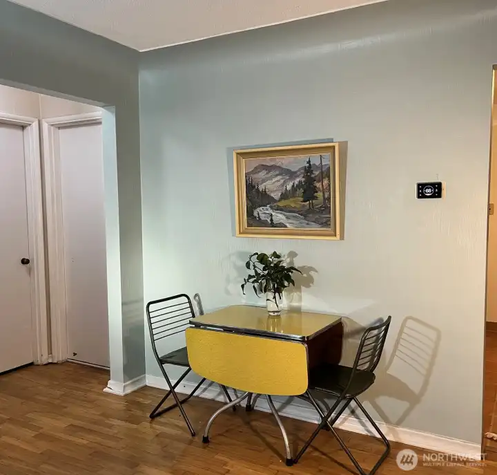 Hardwood floors and coved ceilings.
