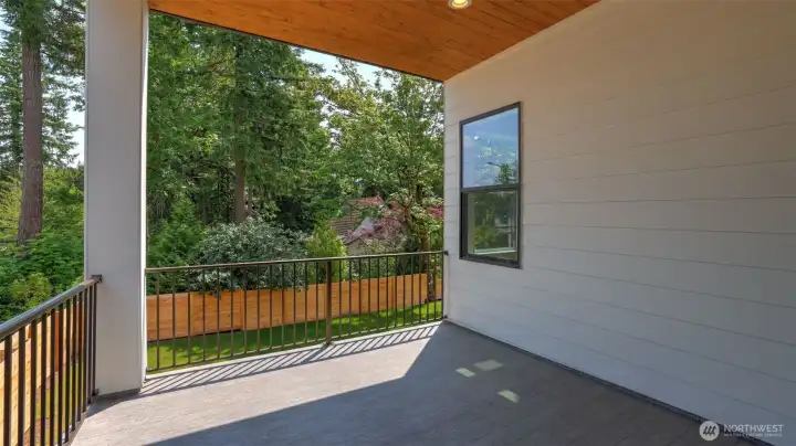 Covered deck is ideal for year-round enjoyment.