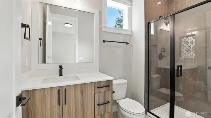 Main Level Guest Bedroom Suite's 3/4 Bath.