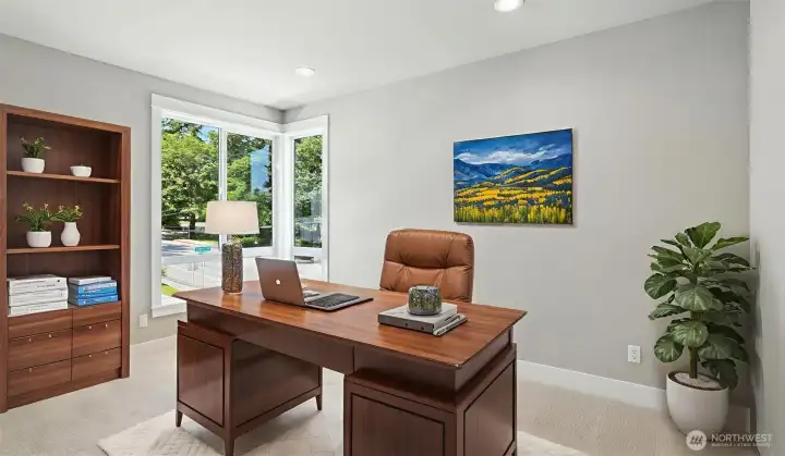 Desirable 2nd Den, located on the Upper Level. Virtually staged.