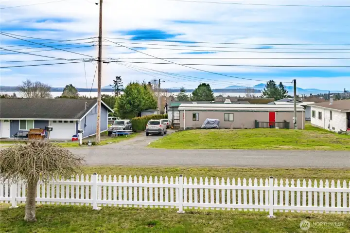 View from living room, primary bedroom, front yard