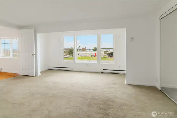 View to water from primary with entry from living room on left.