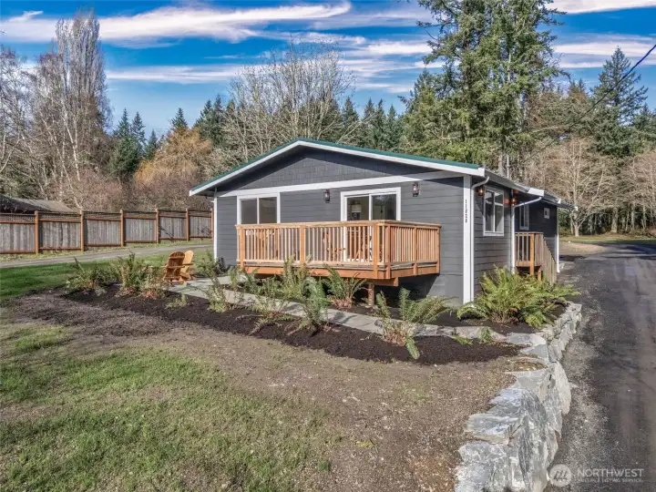 Beautifully remodeled 4 BR home on almost 2 level acres.