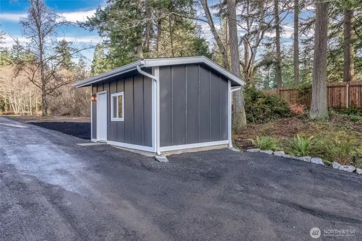 Nice finished outbuilding with electric and heat. Over 200 sq. ft.