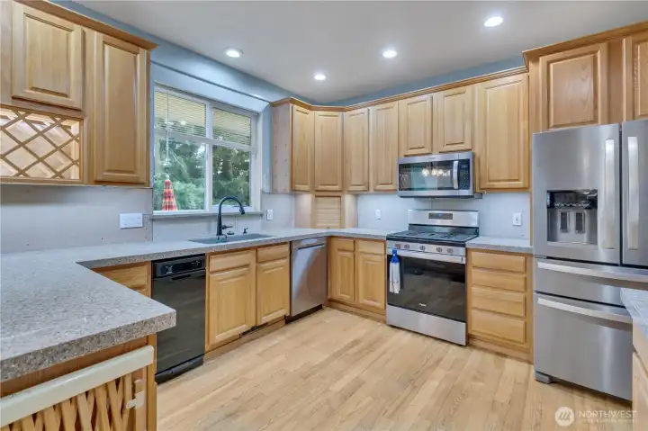 Built in breadbox in the far corner. Some outlets have built in USB plugs. Appliance to the left is the compactor and the one in the corner is the dishwasher.