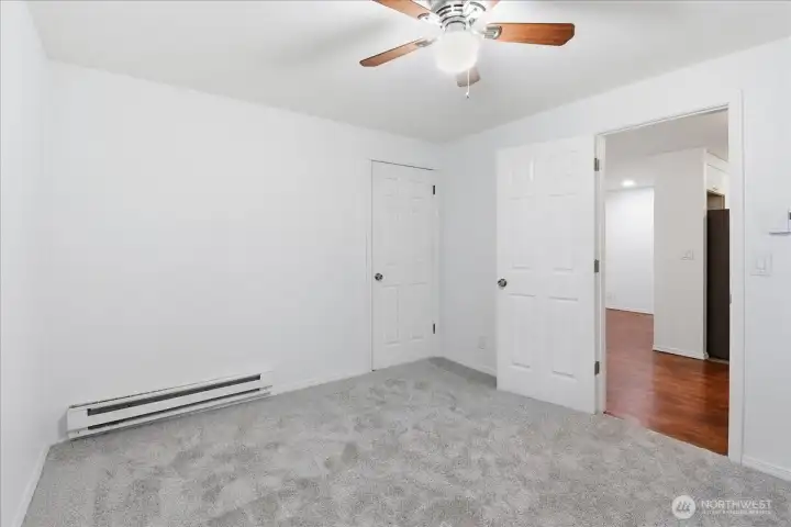 Another view of the primary bedroom.