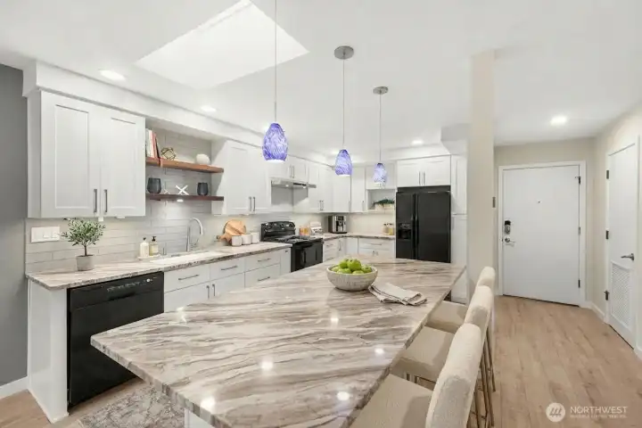 Remodeled kitchen with huge island. Virtual Stage.