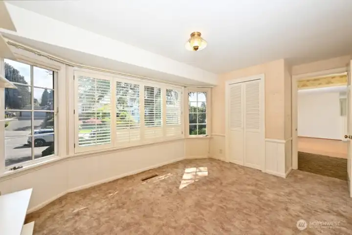 Front Bedroom #1 or Den off main entry way. A great flexible space which could be used as a den, office or just anything one needs.