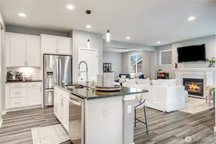 Large island. To the left of the fridge is an ideal location for your coffee and/or wine bar. To the right of the fridge, additional closet storage. This house has an incredible amount of storage.