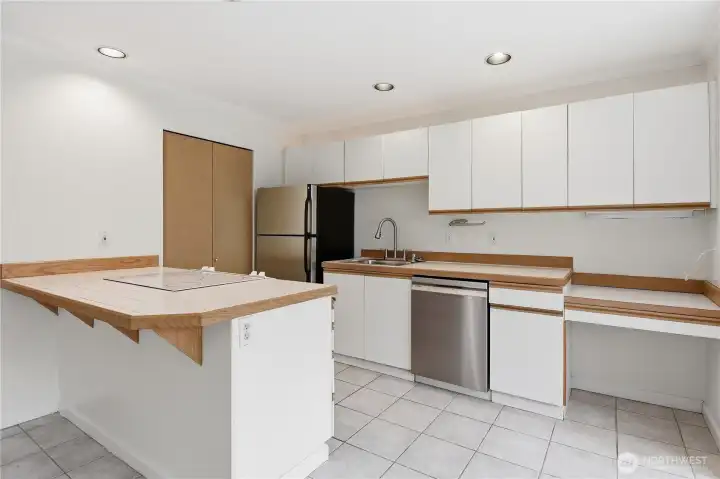 Eating space, new dishwasher, sink and disposal.