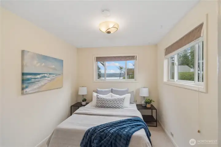 Downstairs bedroom with water views.