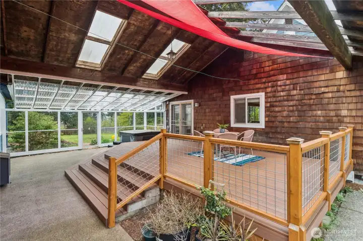 New trex deck leads to 2 car garage and additional dwelling/bonus area