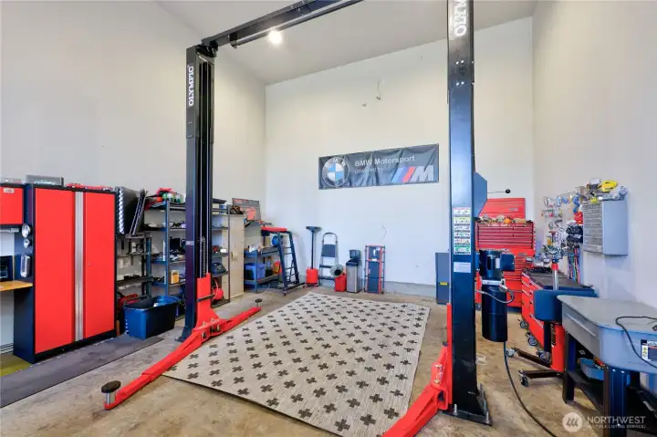Detached shop with lift and room for RV or boat