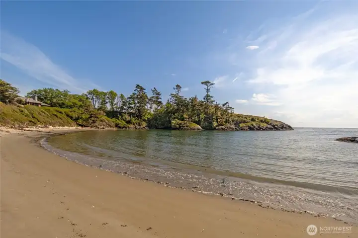 A breathtaking crescent of sandy shoreline at Kanaka Bay stretches out below the property, offering calm, protected waters ideal for kayaking, paddleboarding, and coastal exploration. This rare waterfront setting captures the very essence of island living at its most serene and unspoiled.