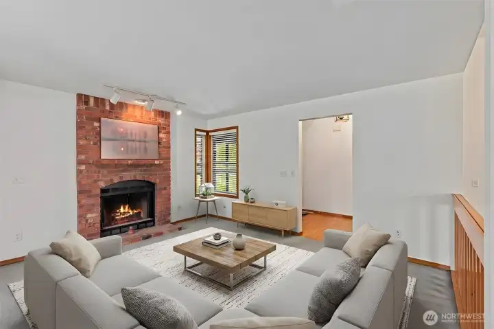 Located just off the kitchen, this inviting family room features plush carpeting and a classic fireplace, creating a warm and comfortable atmosphere for relaxing. This versatile "extra" room is perfectly scaled for movie nights or a quiet reading nook, keeping you connected to the kitchen while offering a distinct, cozy zone. Virtually Staged. Located just off the kitchen, this inviting family room features plush carpeting and a classic fireplace, creating a warm and comfortable atmosphere for relaxing. This versatile "extra" room is perfectly scaled for movie nights or a quiet reading nook, keeping you connected to the kitchen while offering a distinct, cozy zone. Virtually Staged.