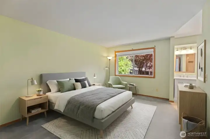 This king-sized retreat is thoughtfully positioned to maximize privacy with views of the lush greenery out back. The attached ensuite bathroom provides convenience and style, while the ample floor plan allows for a seating area or additional storage. A beautifully kept space that reflects the home's overall pride of ownership. Virtually staged. This king-sized retreat is thoughtfully positioned to maximize privacy with views of the lush greenery out back. The attached ensuite bathroom provides convenience and style, while the ample floor plan allows for a seating area or additional storage. A beautifully kept space that reflects the home's overall pride of ownership. Virtually staged.