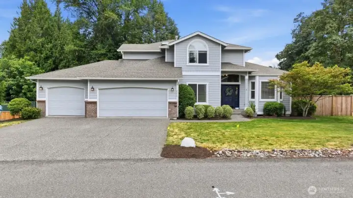Beautiful traditional home situated on a spacious corner lot of over half an acre!