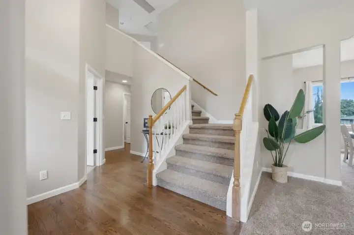 Entry way with beautiful hardwood floors.