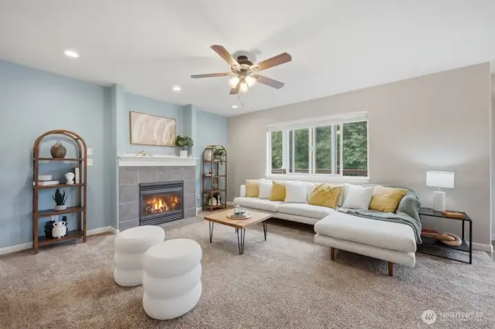 Family room with cozy gas fireplace.