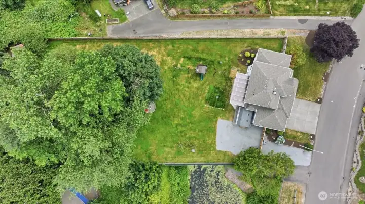 Birds eye view of lot and home.