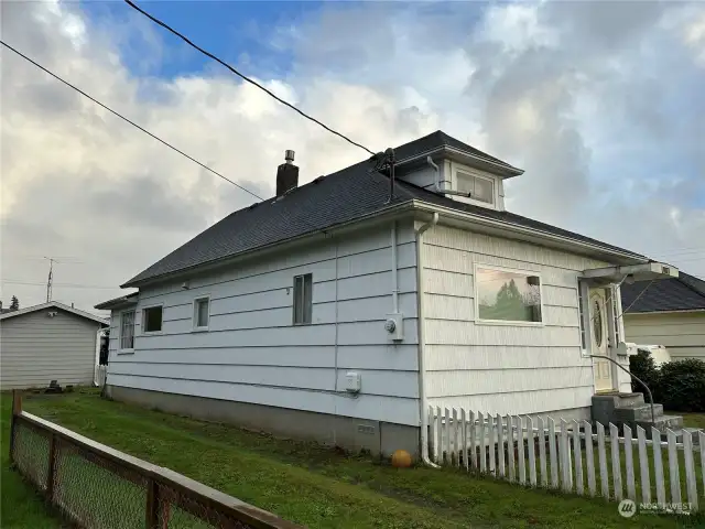 Side view of the house.  The shop is visible in the rear.