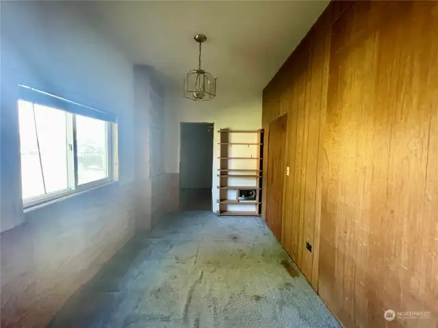 Bedroom looking into the walk-in closet.