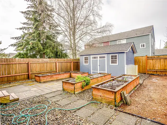 Fenced backyard with room to garden!