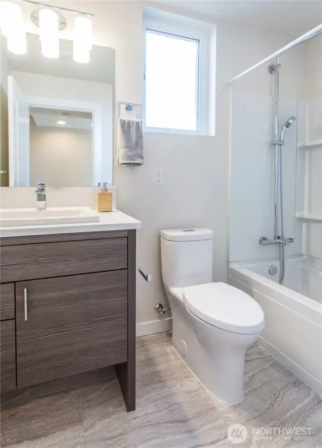 2nd upper floor bathroom of a previous model home in the Avenue plan.  The Courtyard plan also has an upper floor guest bathroom.