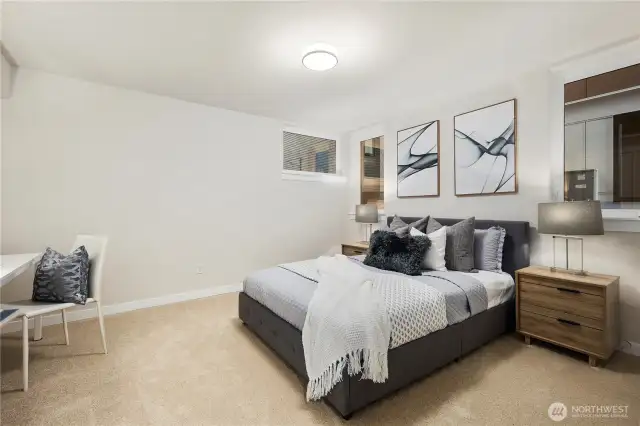 Very spacious bedroom on the main entry level.  Perfect for a home-based business, private guest space, or roommate situation. Some residents have even air b and b'd this space out.