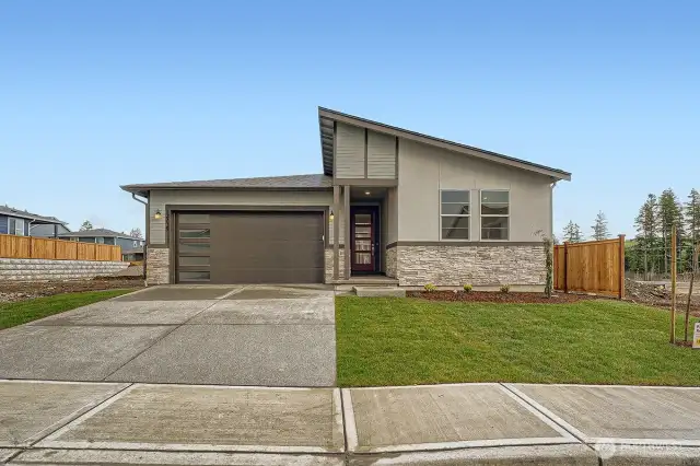 Photo is of other completed home used for example. NOT the home under construction.