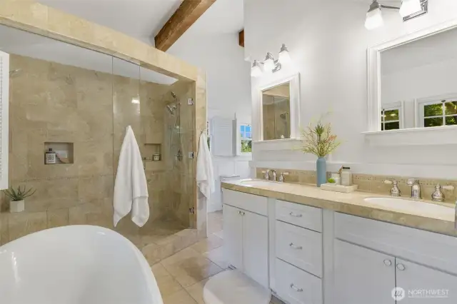 Opens to spa-like shower and soaking tub