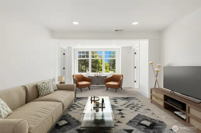 Spacious lower family room for game nights and movie watching