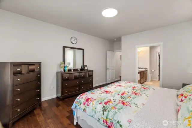 Here is the main floor primary bedroom with 5-piece bath and walk in closet.