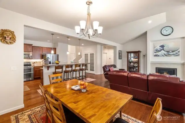 Open concept living downstairs is spacious and comfortable. Among the many upgrades in the home are the engineered hardwood floors, which extend throughout the home with the exception of the 3 bathrooms and the laundry room.