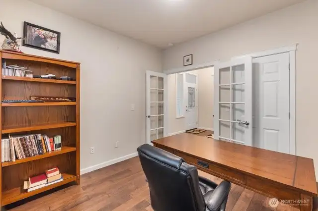 The den/office looking toward the entry. Nice closet in here as well.