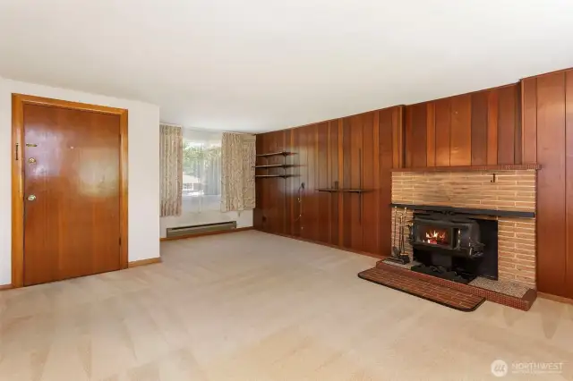 Come into a spacious living room.  Woodstove for those cold winter nights.