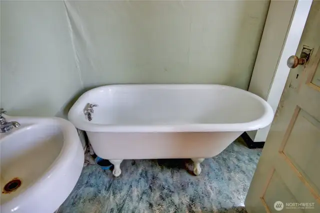 clawfoot tub (no shower) in the existing bathroom