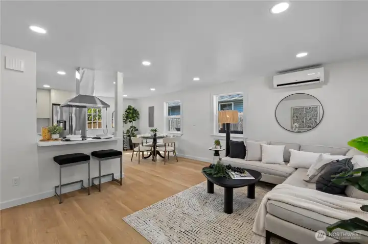 Living Room flows into Kitchen and Dining